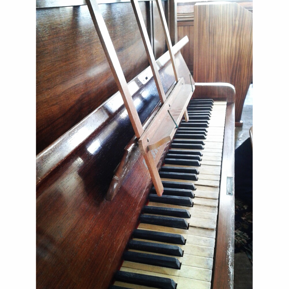 Old piano in my local chapel.